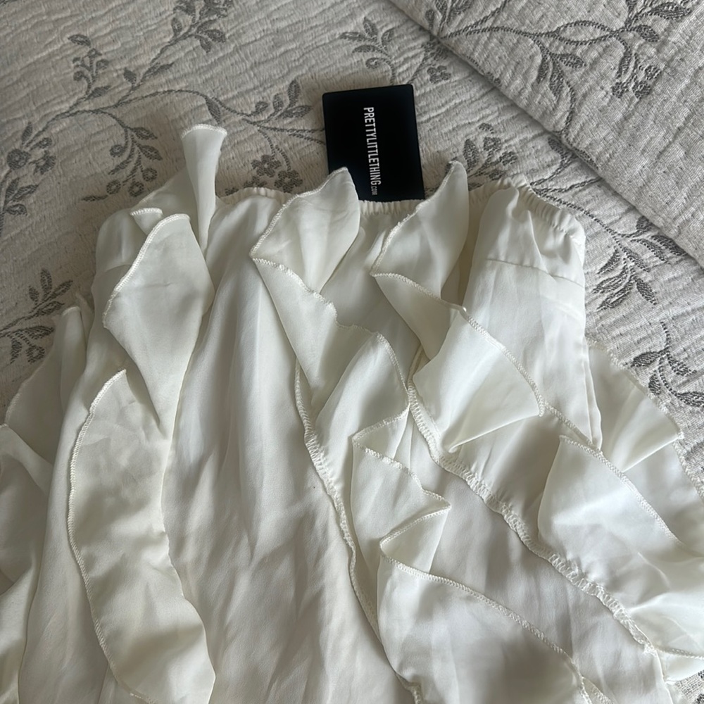 Cream bandeau asymmetric frill detail maxi dress.
